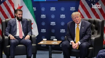 An official U.S. document listing Syria as a state sponsor of terrorism, with an inked stamp resting beside it, unpressed — the final approval not yet given.
